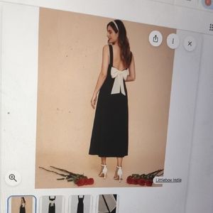 Elegant Black Dress with White Bow